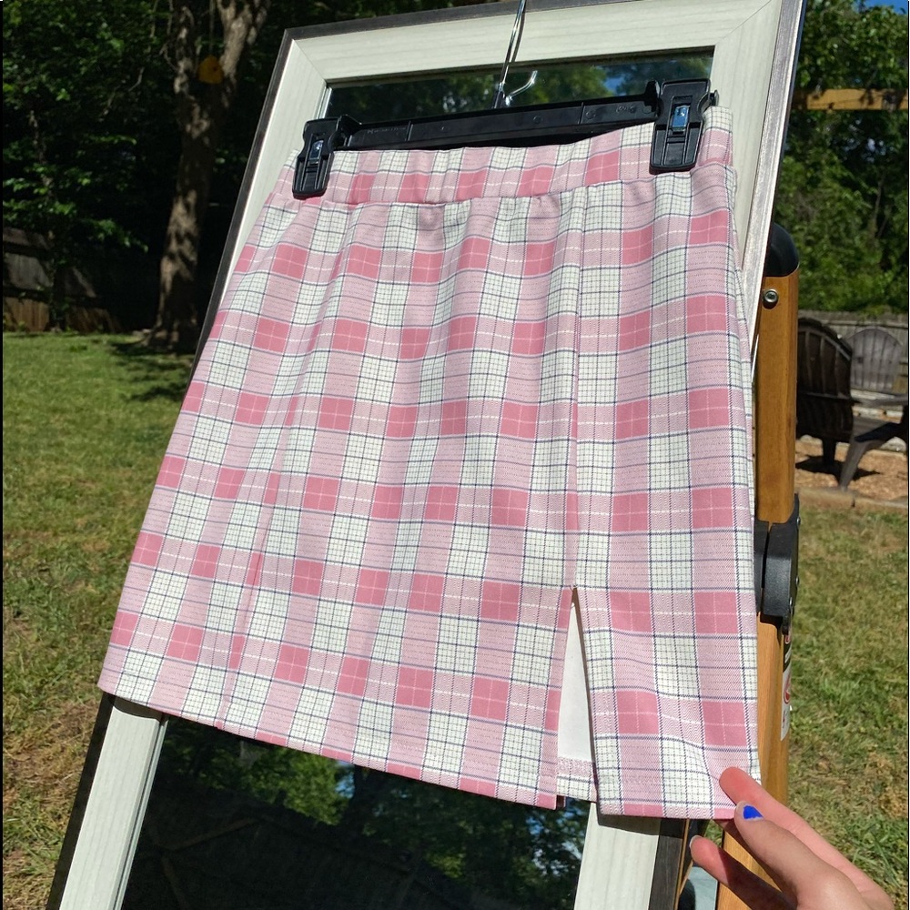 Pink plaid skirt. Very form fitting